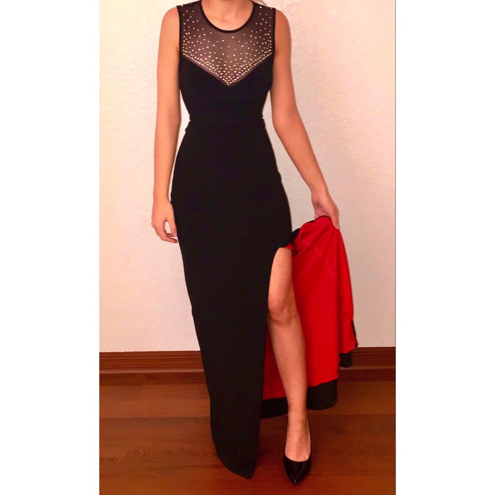 Black bedazzled prom dress with red slit
